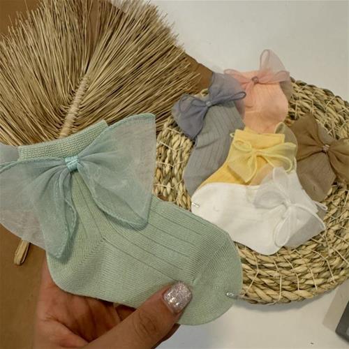 جوراب بچگانه پاپیون دار از نوزادی تا 2 سال